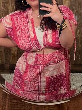 Pink Paisley Dress with cut out in the midsection, ties at the bust.